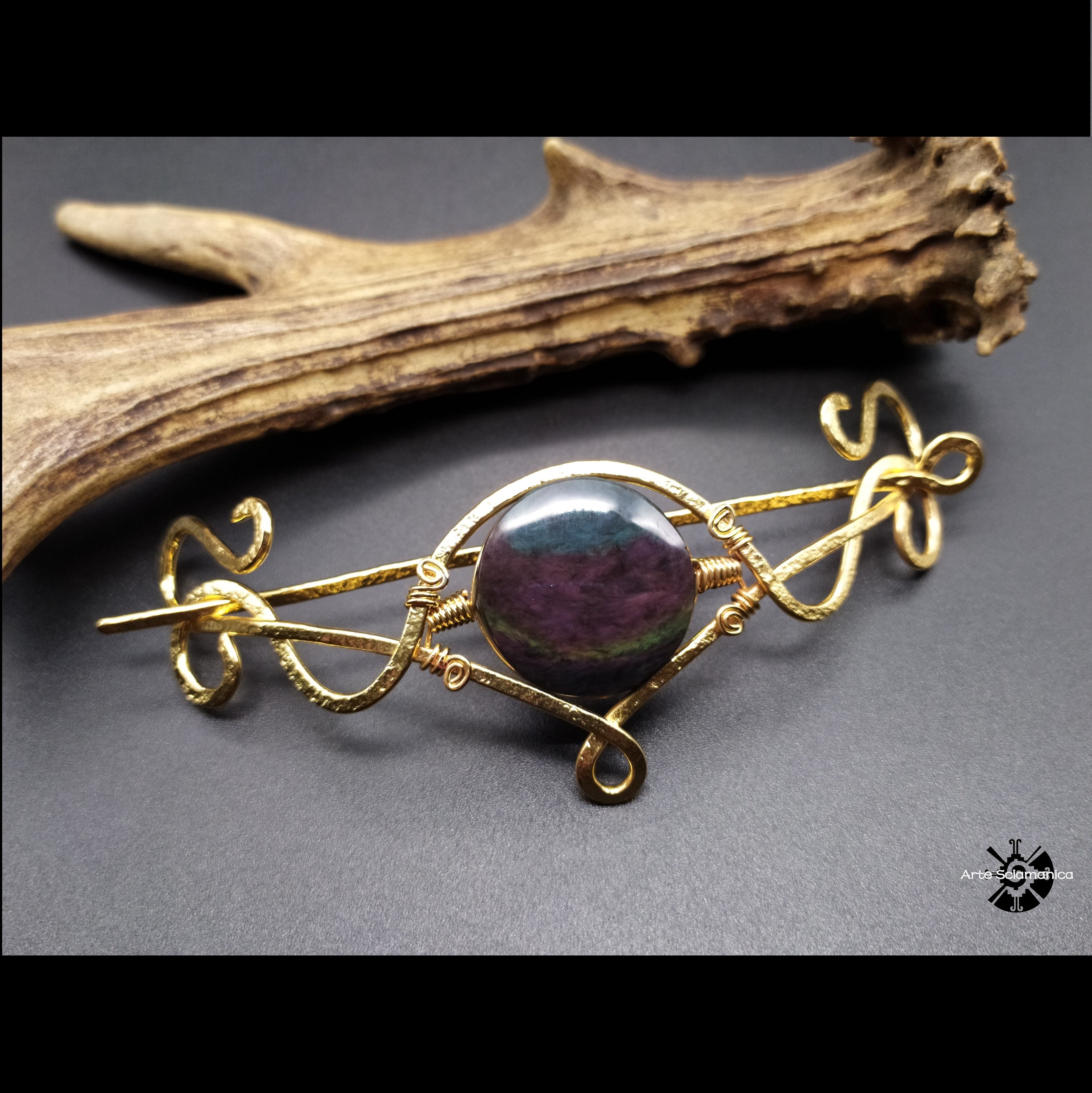 Spillone con ossidiana "manto huichol"