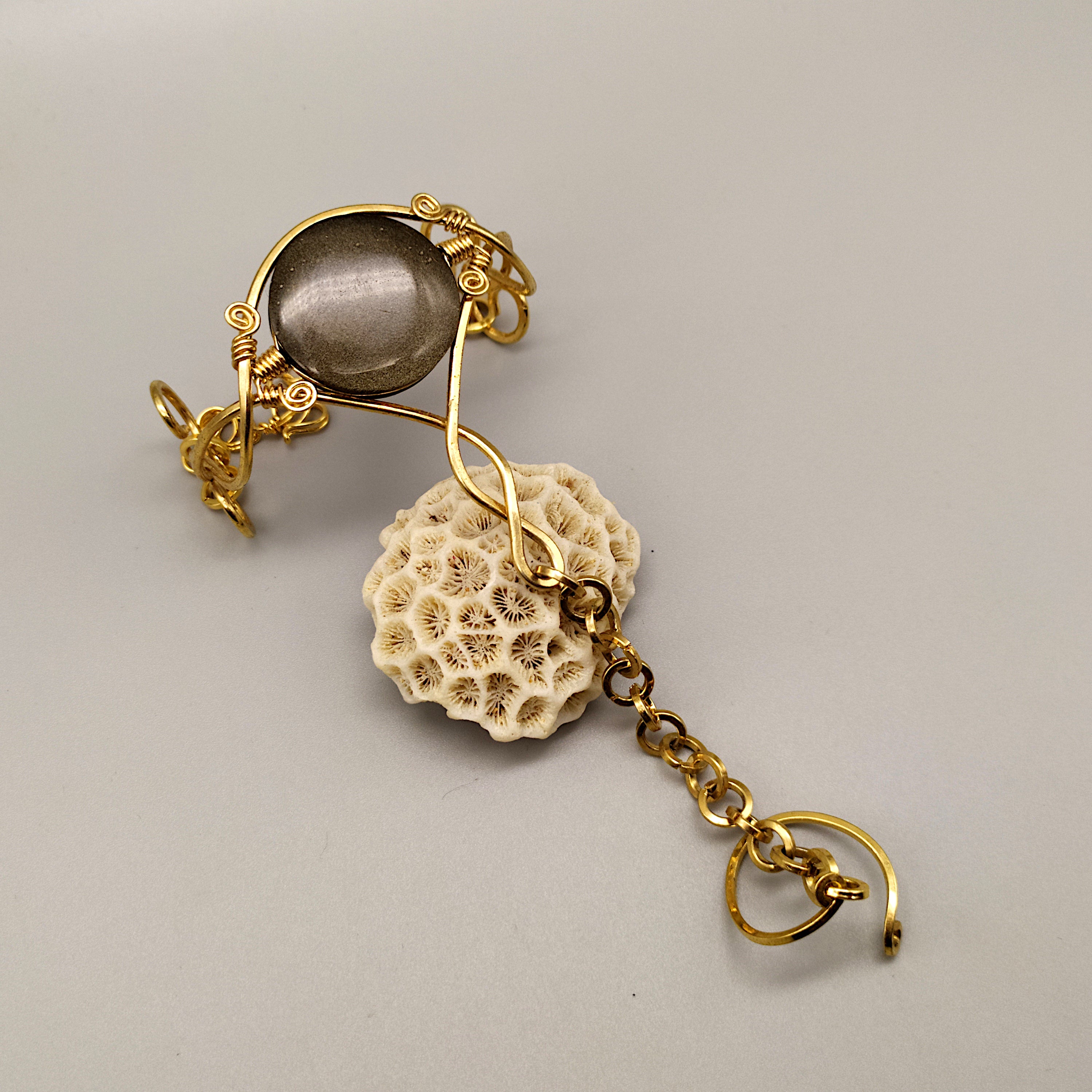 Baciamano con ossidiana dorata