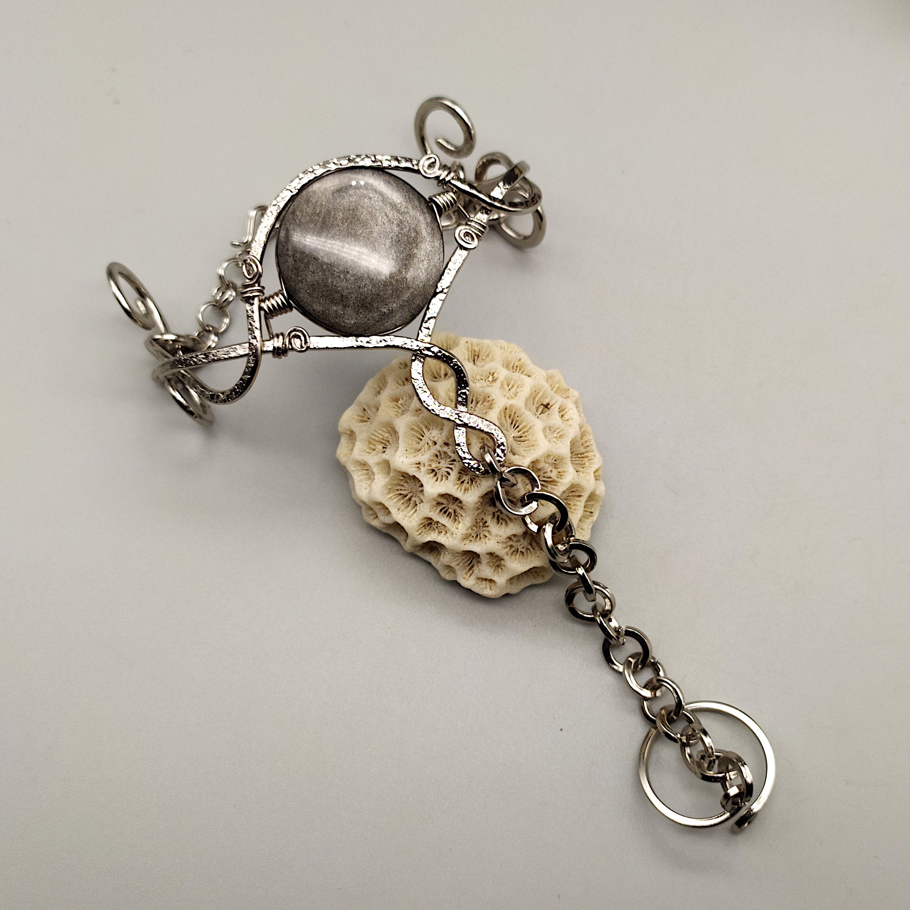 Baciamano con ossidiana argentata